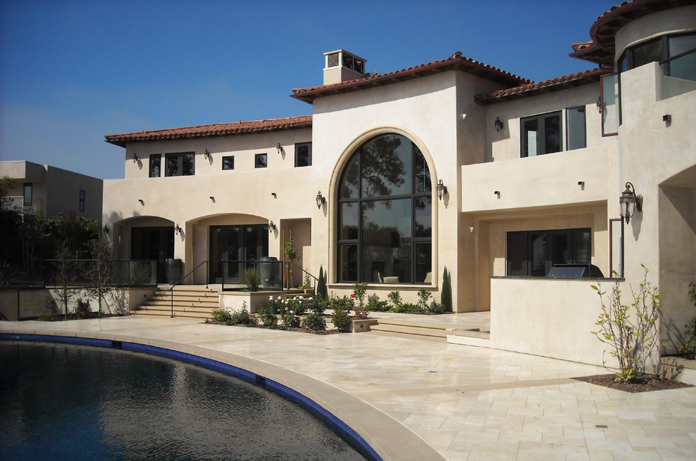 This is an example of a mediterranean two-storey exterior in San Diego.
