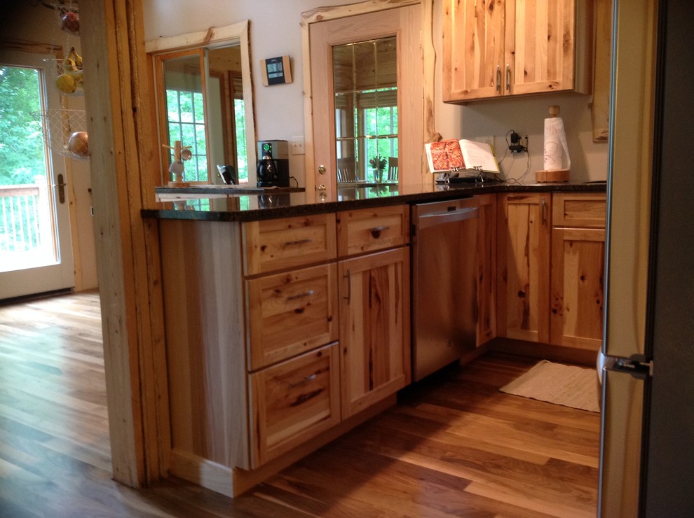 This is an example of a country kitchen in Minneapolis.