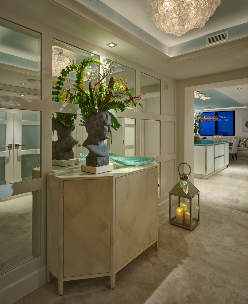 This is an example of a beach style entry hall in Miami.