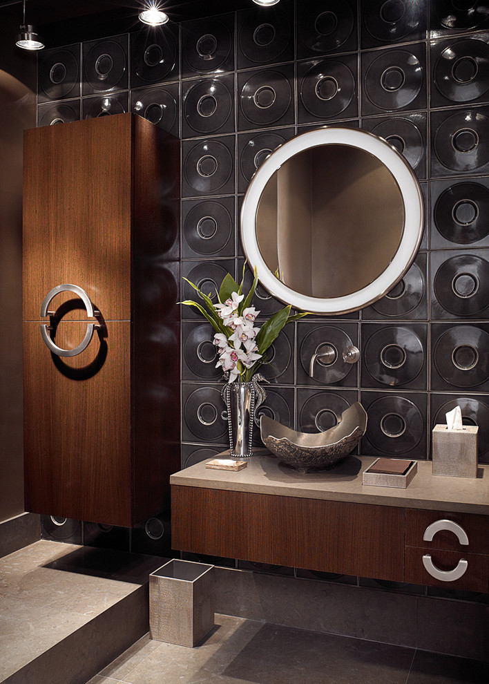 Inspiration for a contemporary bathroom in Miami with a vessel sink and black walls.