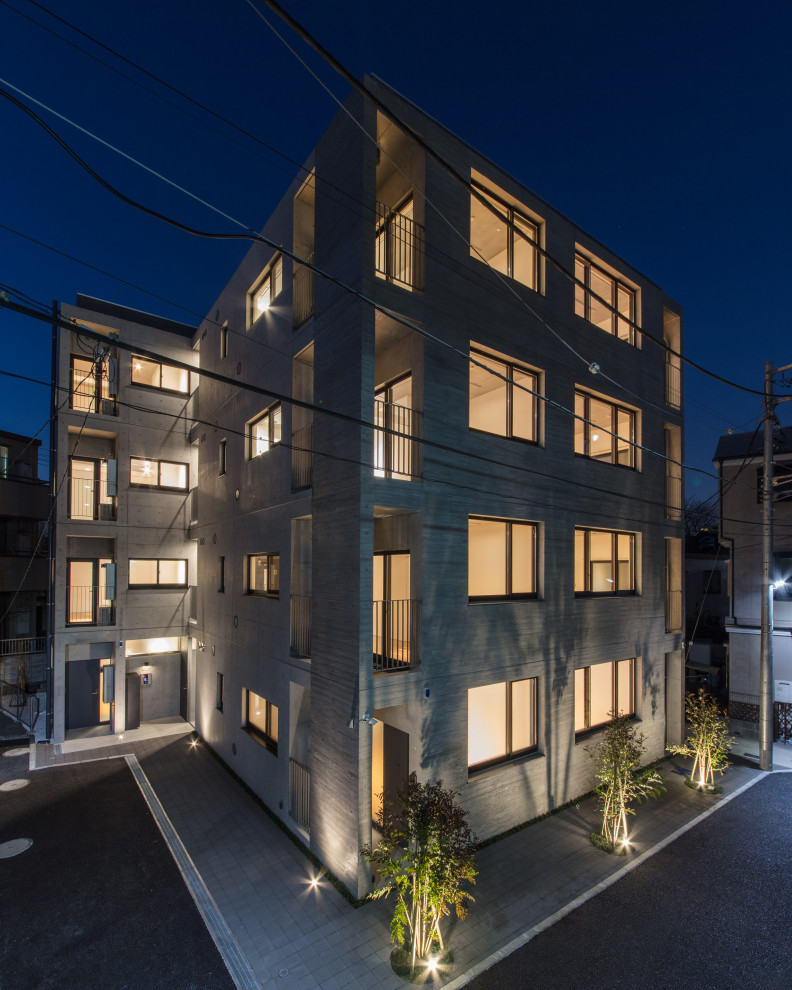 横浜にあるラグジュアリーな巨大なモダンスタイルのおしゃれな家の外観 (コンクリートサイディング、アパート・マンション) の写真