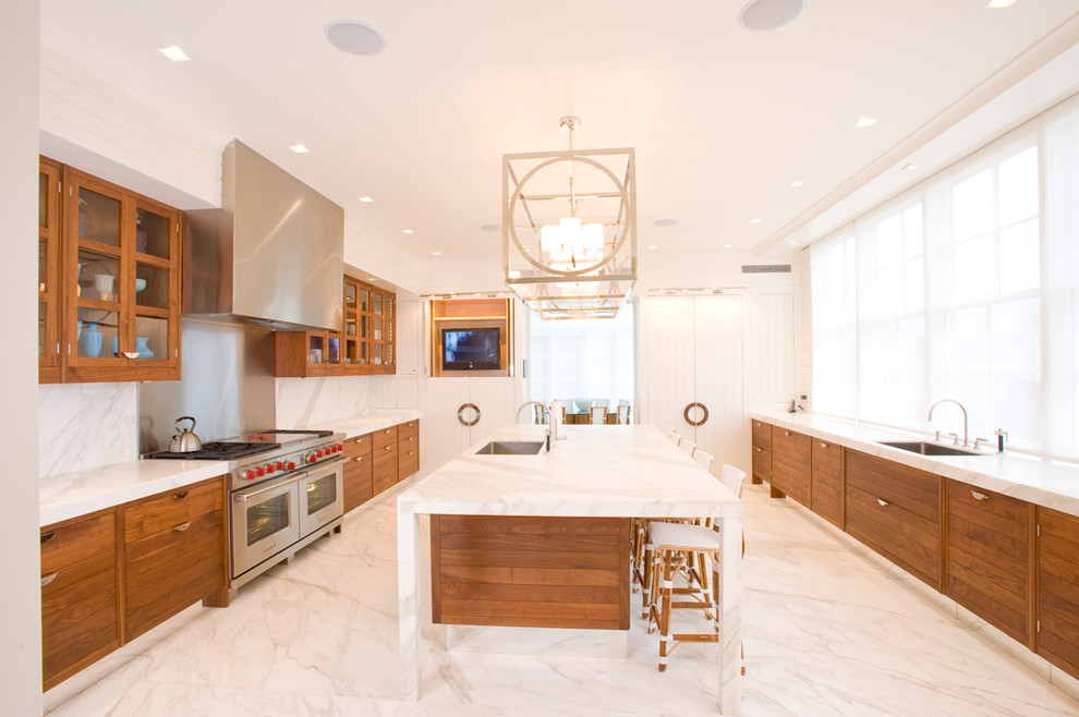 Contemporary kitchen in New York with glass-front cabinets and stainless steel appliances.