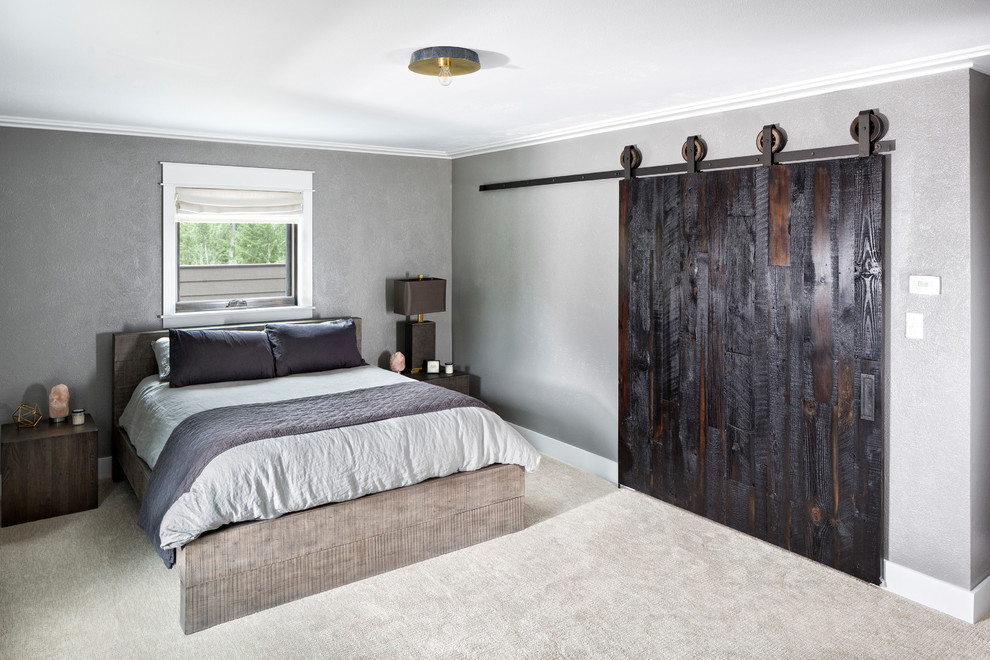 Photo of a mid-sized country guest bedroom in Denver with grey walls, carpet and beige floor.