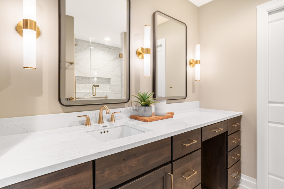 Inspiration for a transitional porcelain tile and beige floor bathroom remodel in Minneapolis with recessed-panel cabinets, dark wood cabinets and beige walls
