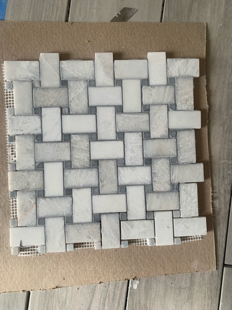 grout-bleeding-into-marble-tiles