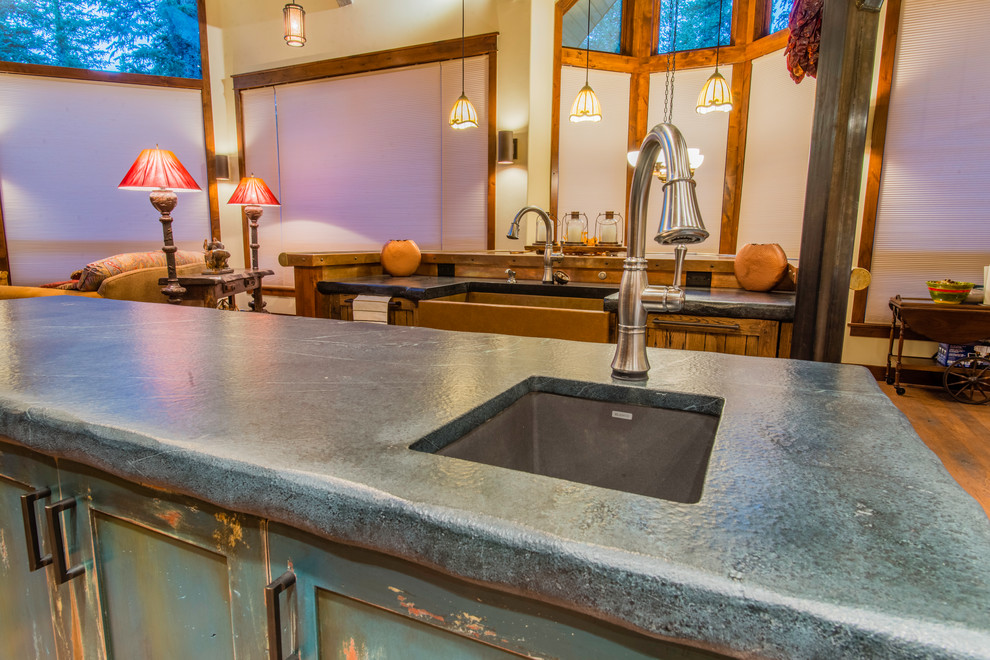 Example of a mountain style kitchen design in Denver