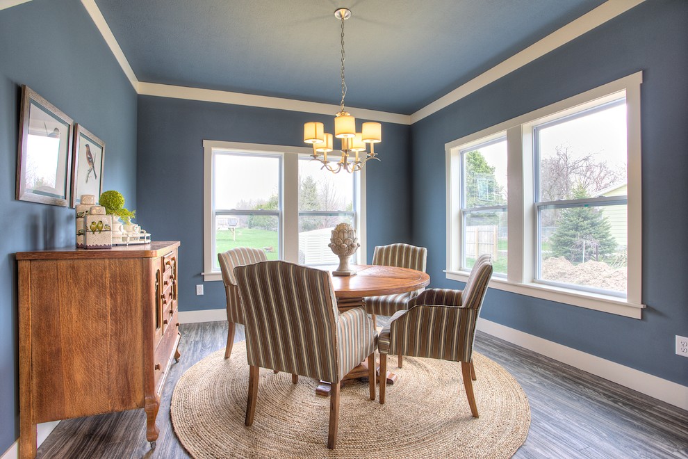 Inspiration for a traditional separate dining room in Grand Rapids with blue walls and linoleum floors.
