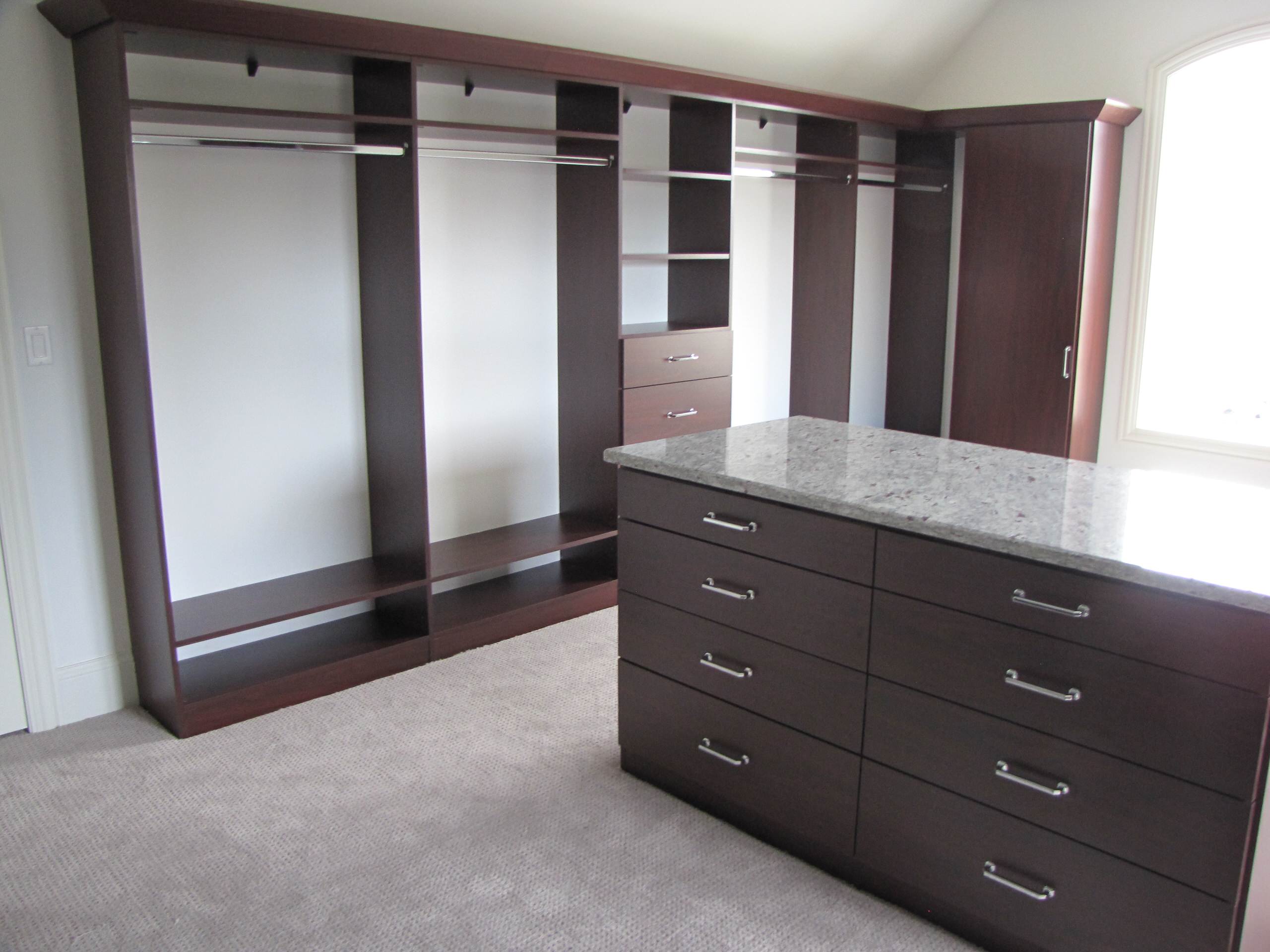 African Walnut Master Closet with Granite Top Island