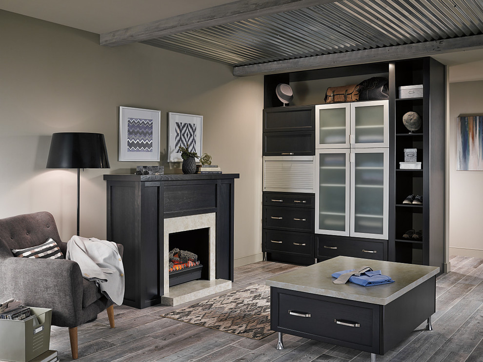 Inspiration for an expansive contemporary gender-neutral walk-in wardrobe in Edmonton with shaker cabinets, dark wood cabinets, porcelain floors and grey floor.