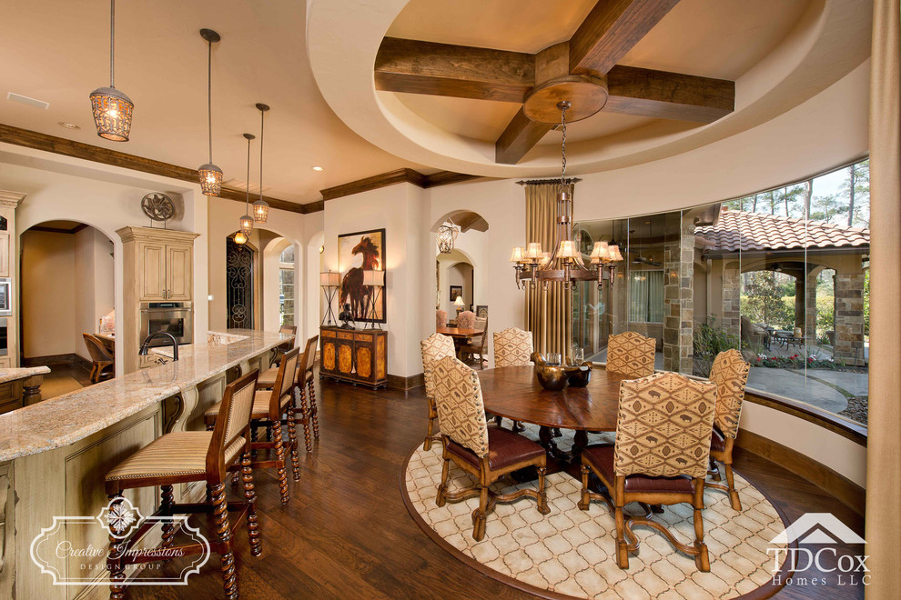Dining room - rustic dining room idea in Houston