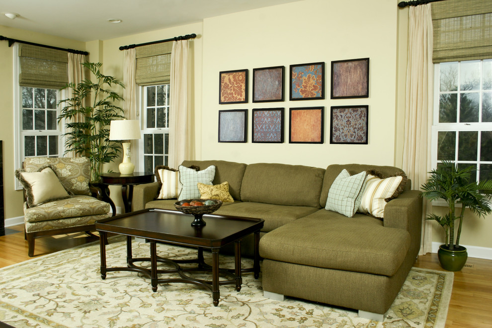 This is an example of a contemporary living room in Other with beige walls.