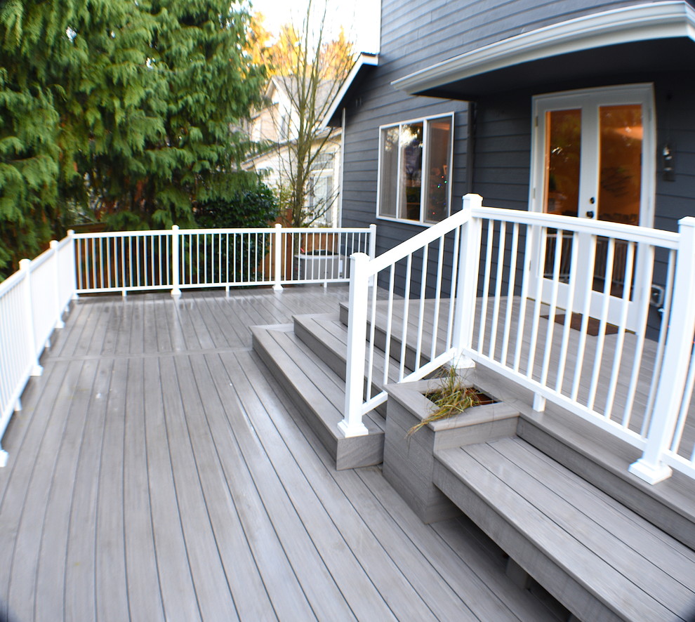 Design ideas for a large contemporary backyard deck in Seattle with no cover.