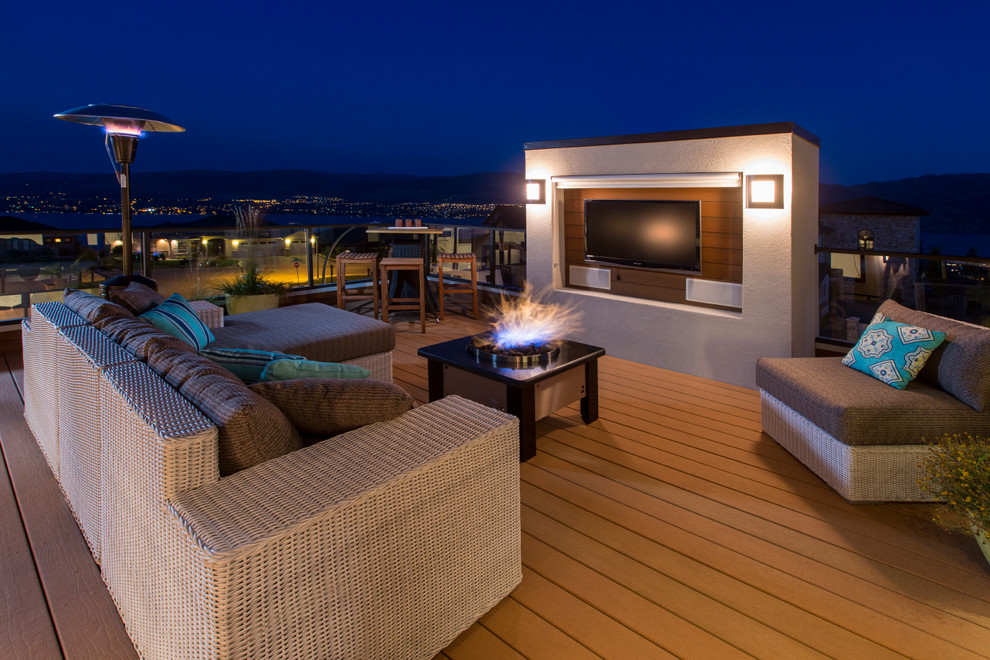 Contemporary rooftop and rooftop deck in Vancouver with a fire feature and no cover.