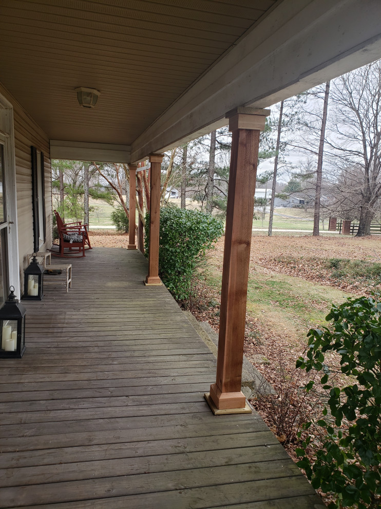 Photo of a mid-sized arts and crafts front yard verandah in Nashville.