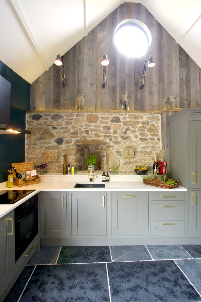 This is an example of an eclectic kitchen in Devon.