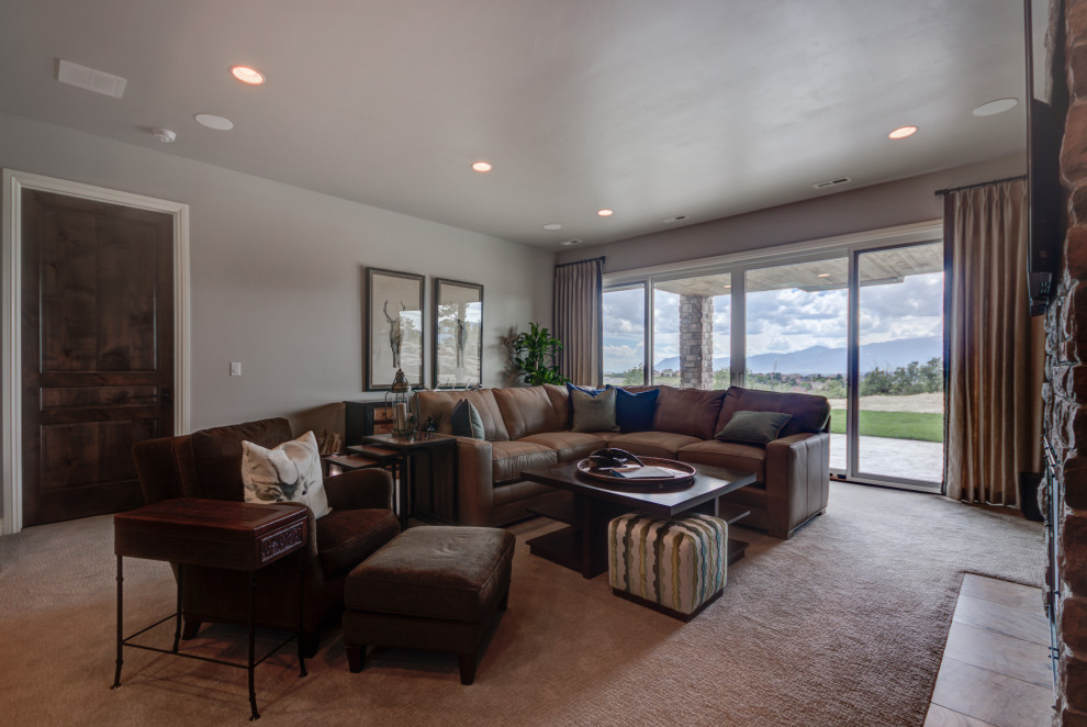 Example of a transitional home design design in Denver