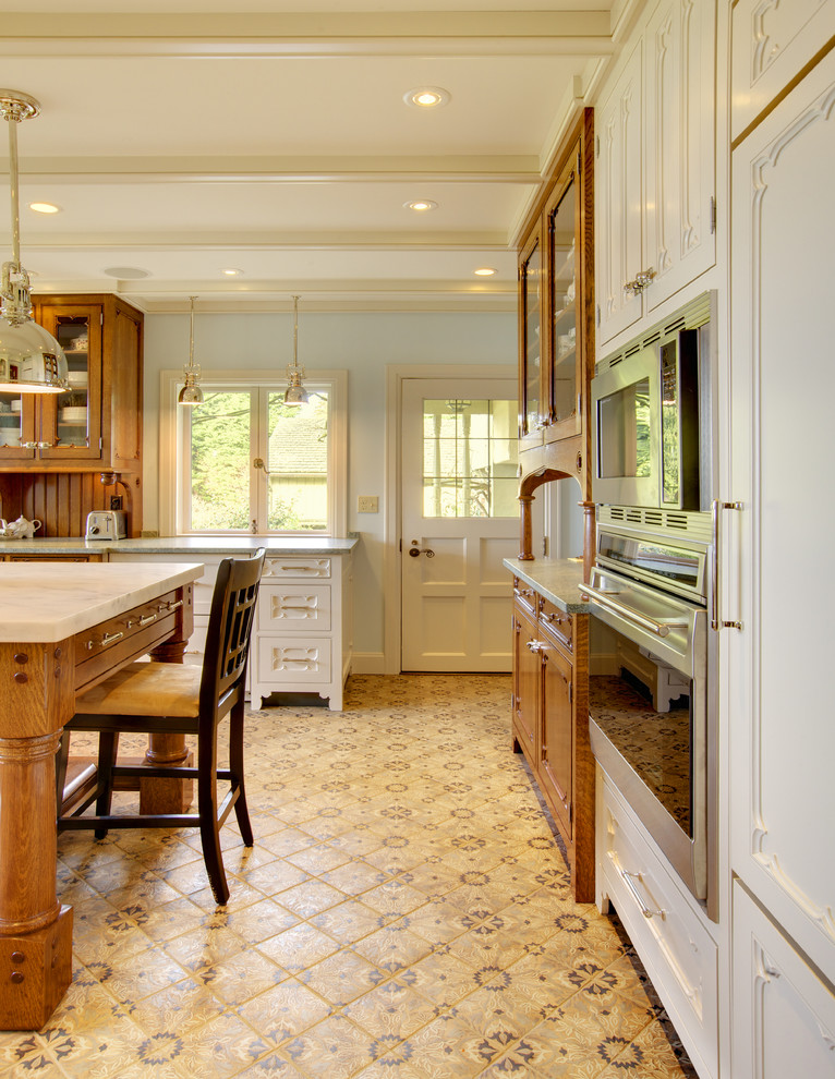 Inspiration for a transitional kitchen remodel in Seattle with recessed-panel cabinets, white cabinets and stainless steel appliances