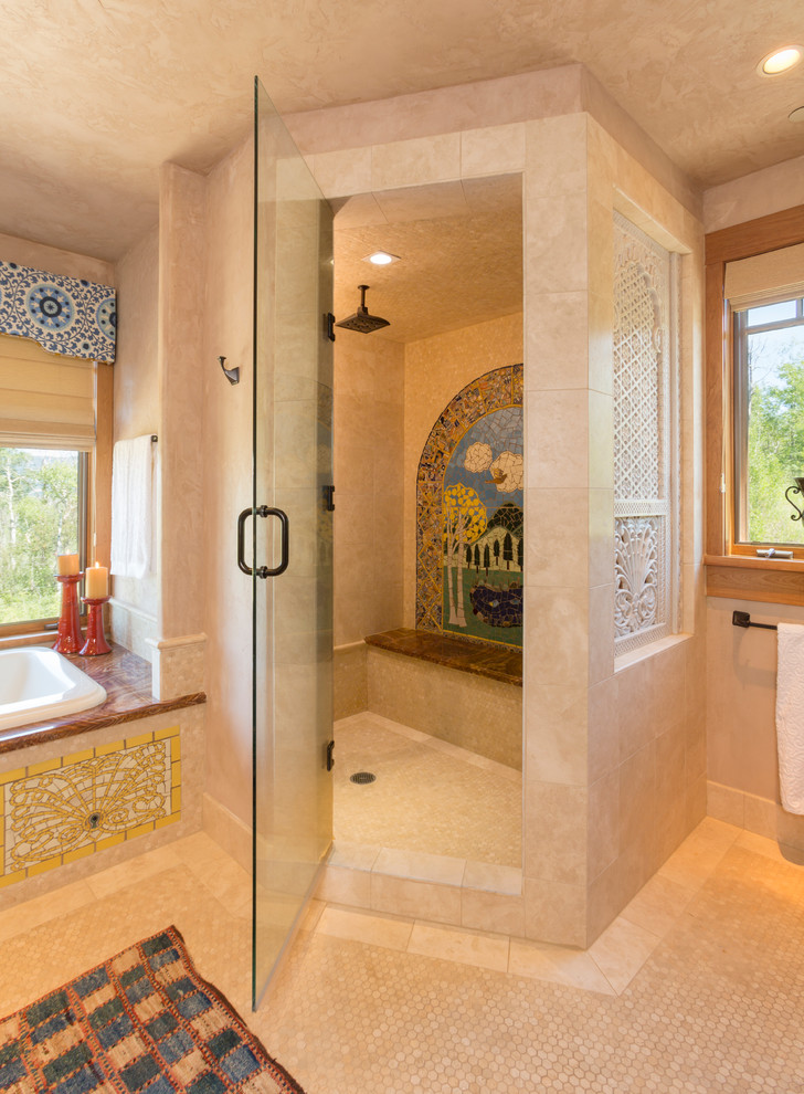 Inspiration for an expansive traditional master bathroom in Denver with recessed-panel cabinets, medium wood cabinets, a corner shower, beige tile and mosaic tile floors.