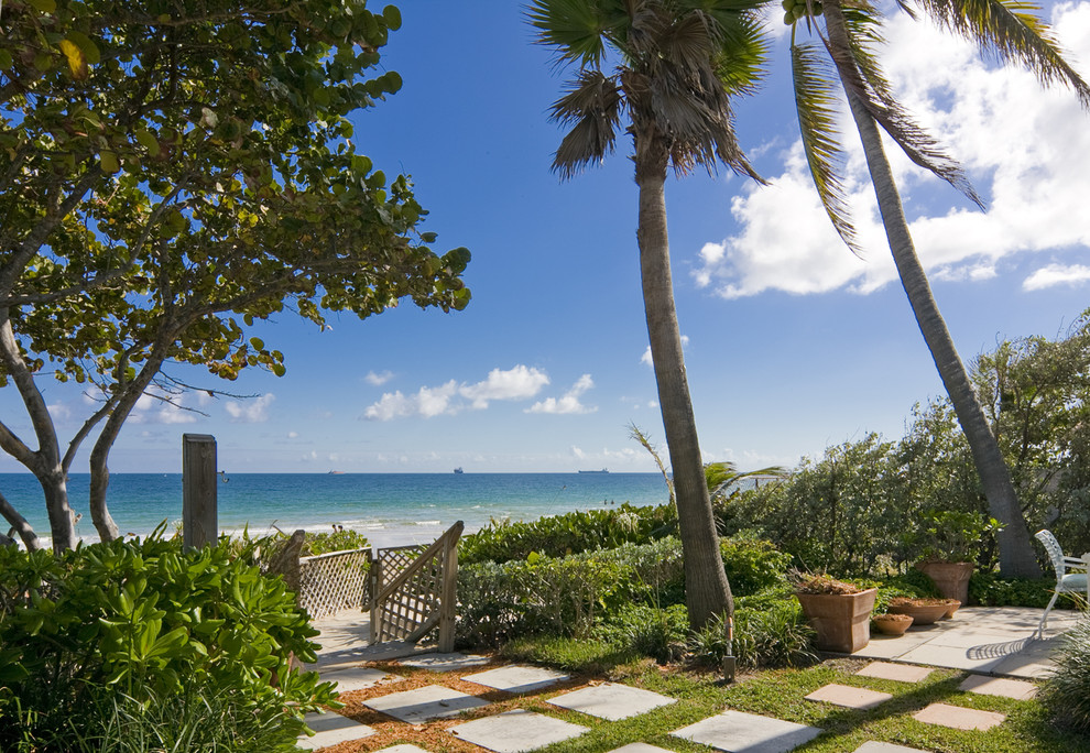 Inspiration for a tropical backyard patio in Miami.