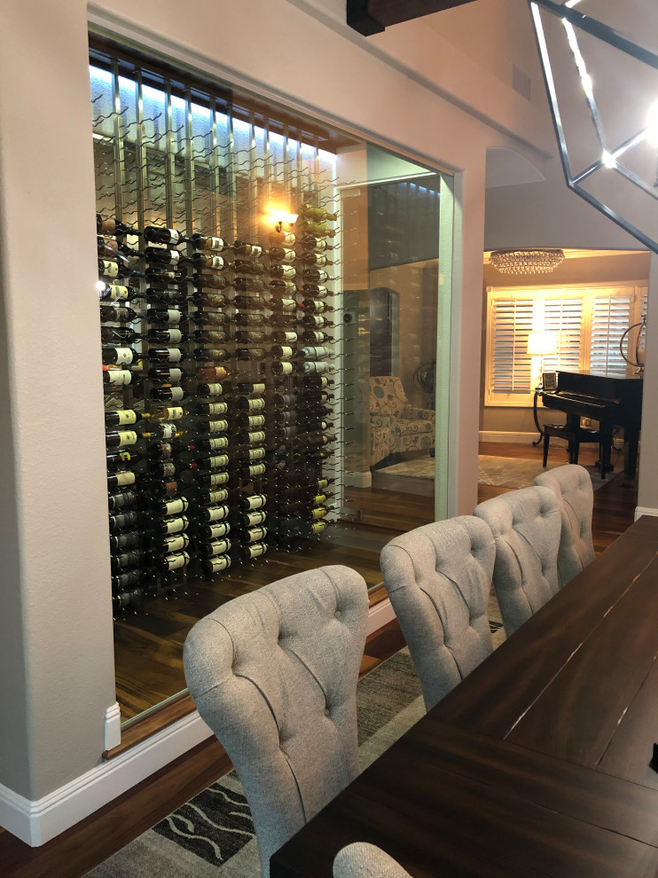 Wine cellar - contemporary wine cellar idea in Other with storage racks