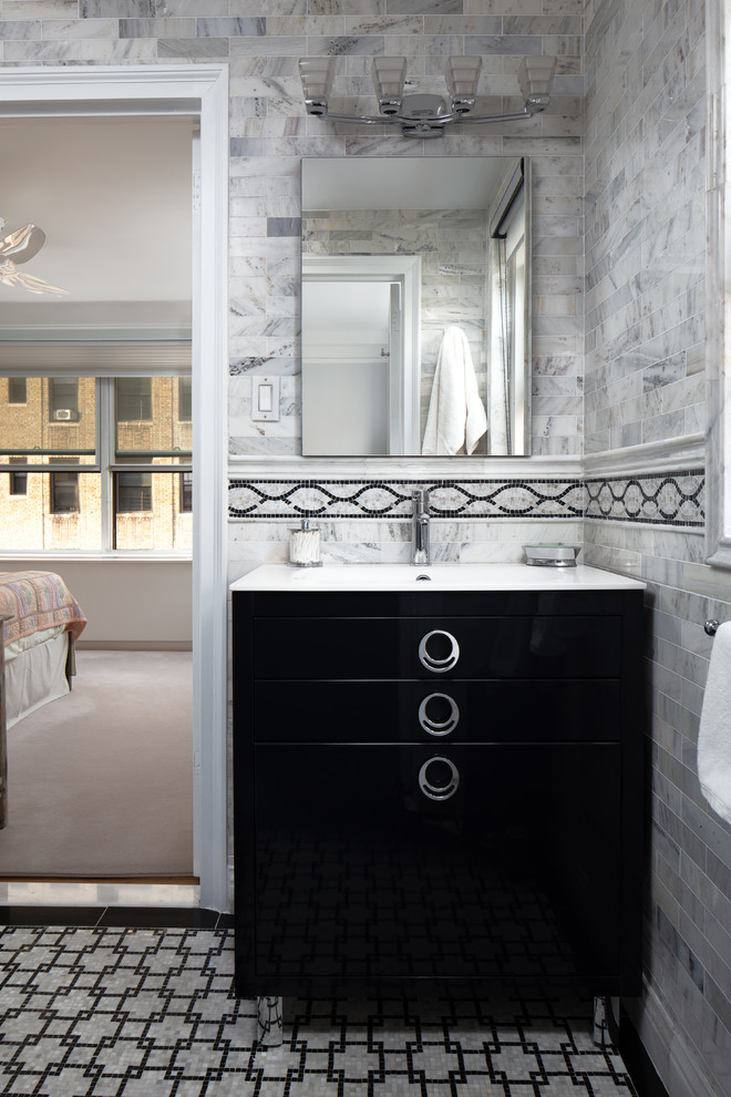 Design ideas for a small traditional master bathroom in New York with furniture-like cabinets, black cabinets, black and white tile, stone tile, porcelain floors, glass benchtops, grey floor and white benchtops.