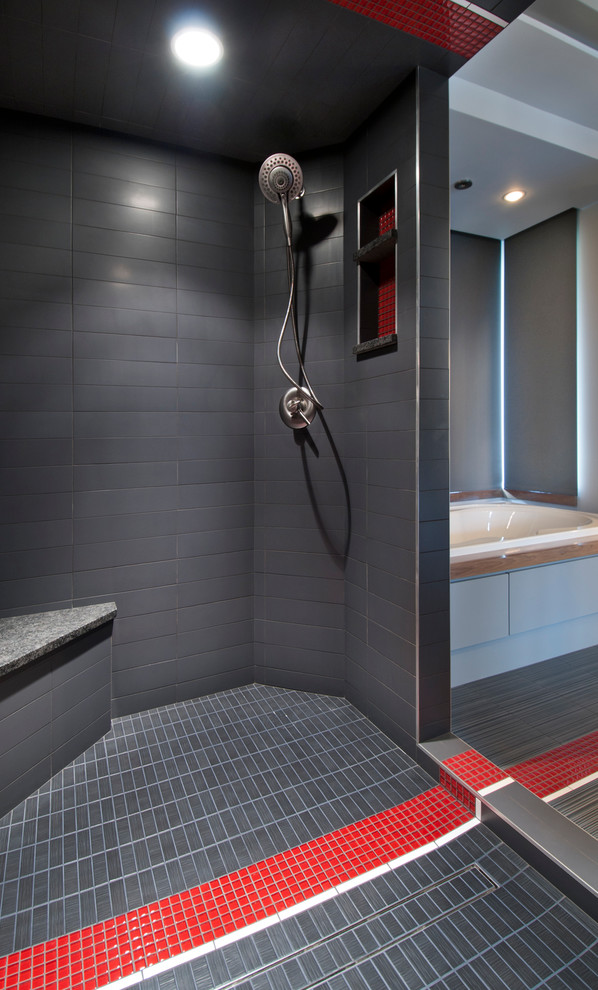 Contemporary bathroom in Minneapolis with a drop-in tub, red tile, gray tile and mosaic tile.