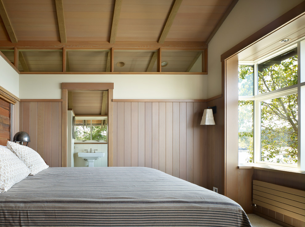 Design ideas for a country bedroom in Seattle with beige walls.