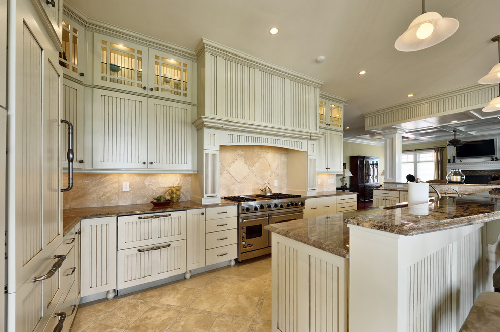 Traditional kitchen in Philadelphia with recessed-panel cabinets, white cabinets, beige splashback and travertine splashback.