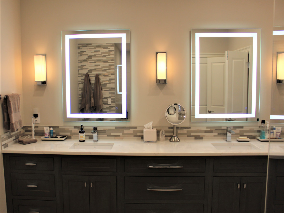 This is an example of a large transitional bathroom in DC Metro with a built-in vanity.