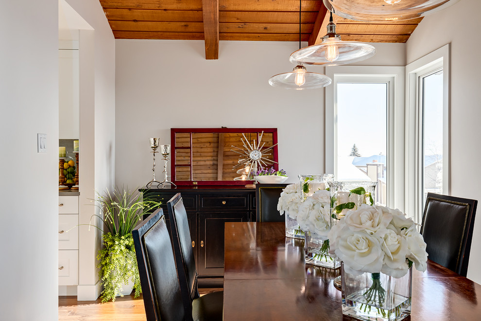 Mid-sized transitional open plan dining in Calgary with white walls and dark hardwood floors.