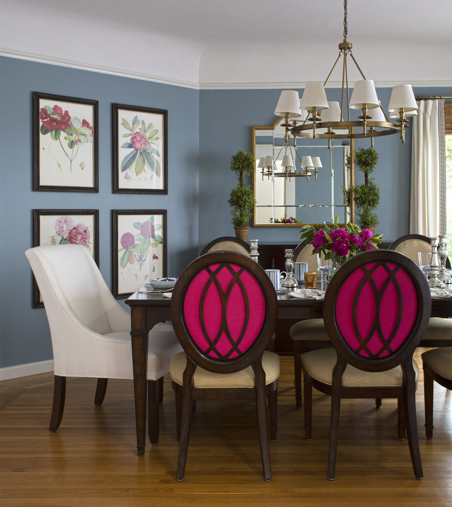 Inspiration for a mid-sized transitional separate dining room in San Francisco with blue walls, medium hardwood floors and no fireplace.