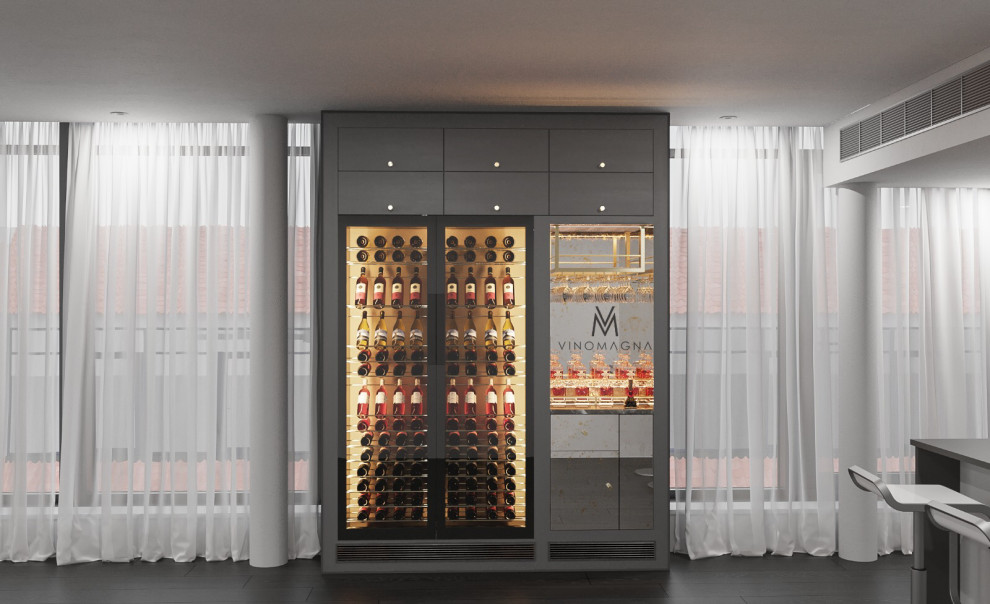 Wine cellar - small modern dark wood floor and brown floor wine cellar idea in London with display racks