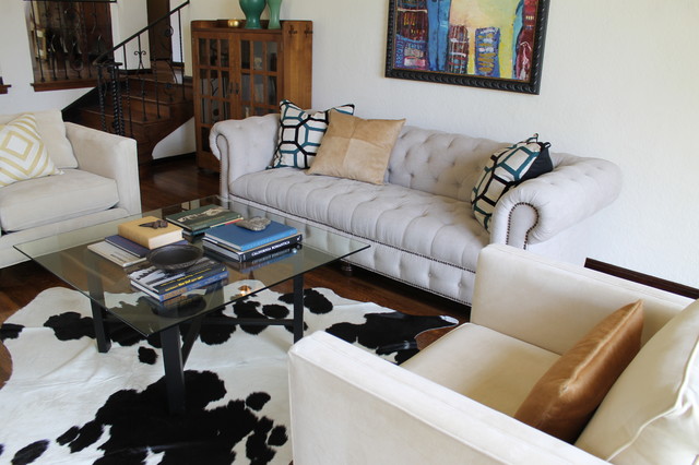 Linen Chesterfield Sofa Glass Cocktail Table And Cowhide Rug