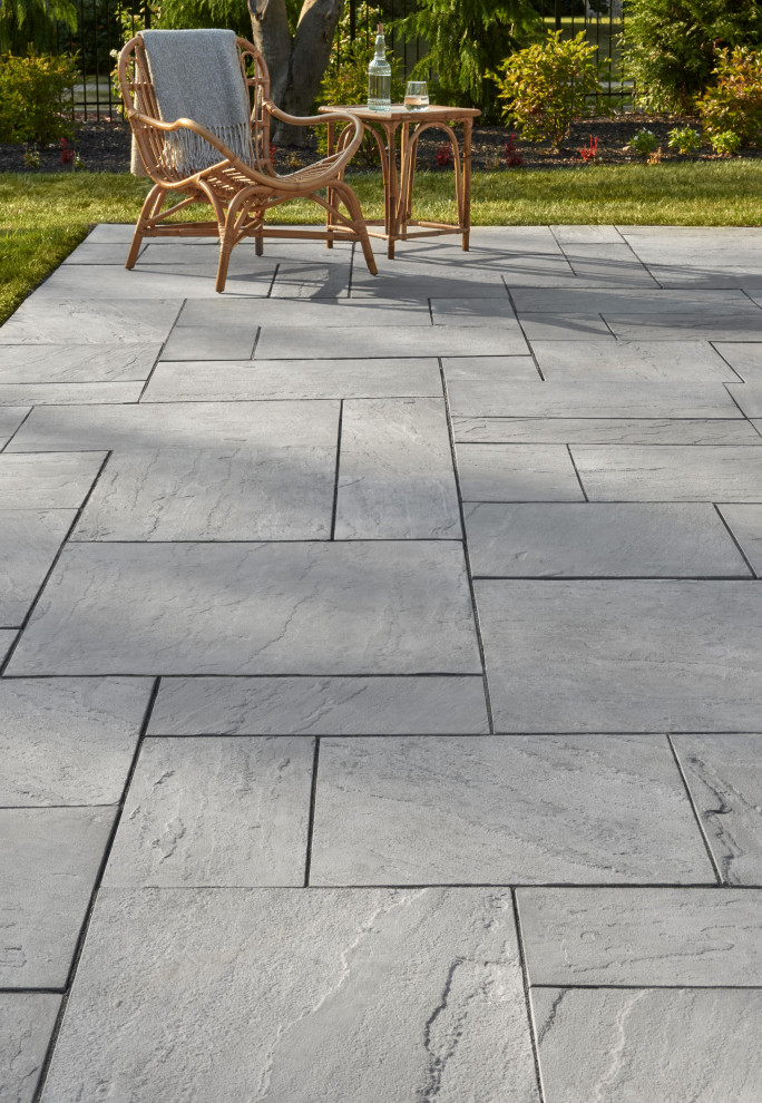 Photo of a contemporary backyard patio in Philadelphia with concrete pavers.