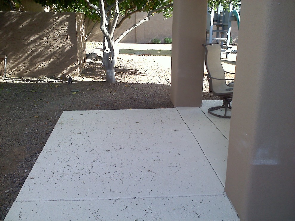 Patio kitchen - transitional backyard concrete patio kitchen idea in Phoenix with a roof extension