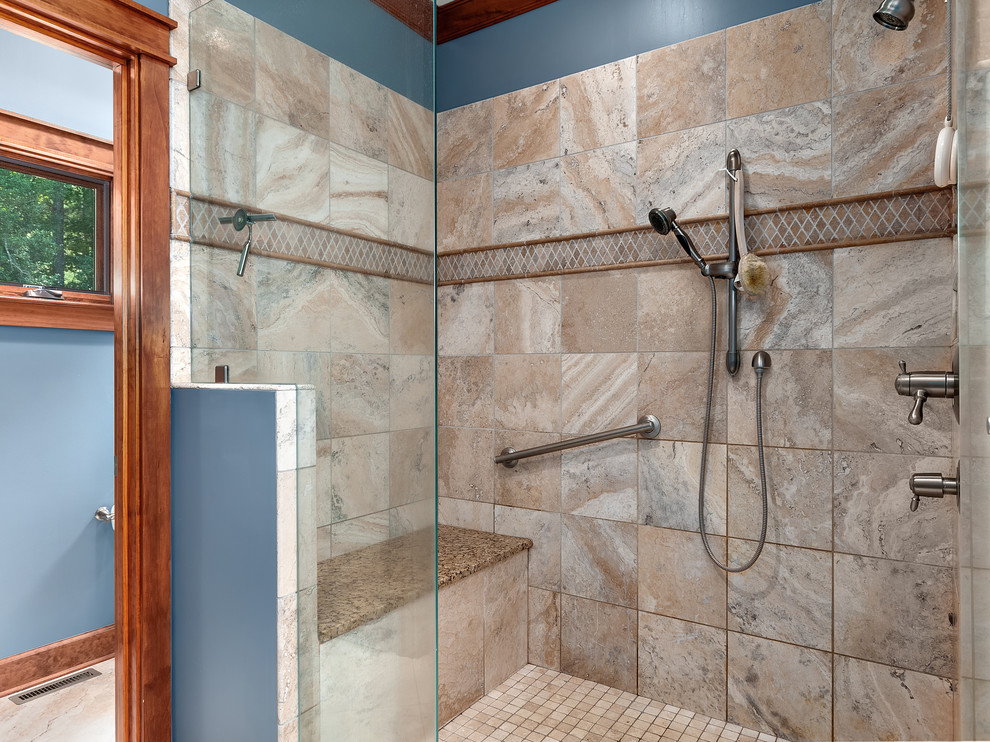 Alcove shower - craftsman brown tile and stone tile alcove shower idea with blue walls