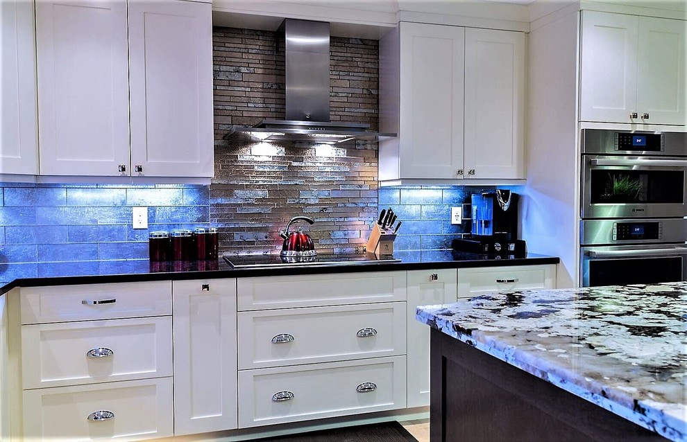 Example of a transitional kitchen design in Toronto