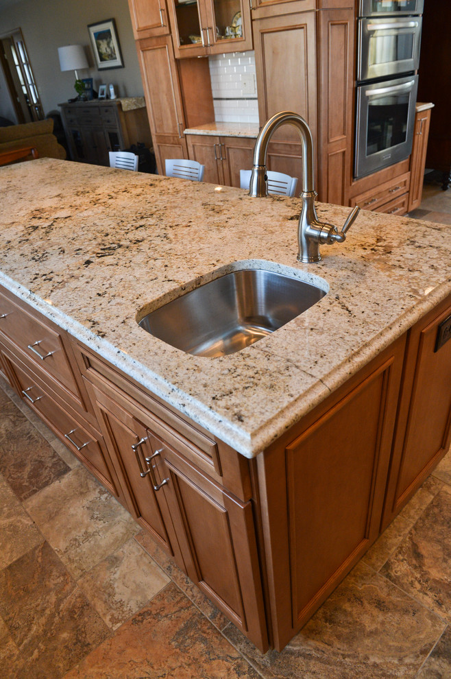 Example of a transitional kitchen design in Cleveland
