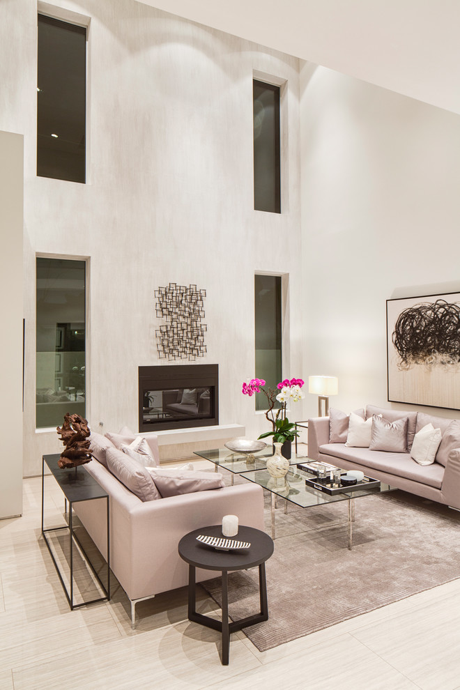 This is an example of a mid-sized contemporary formal open concept living room in Los Angeles with white walls, porcelain floors and a ribbon fireplace.