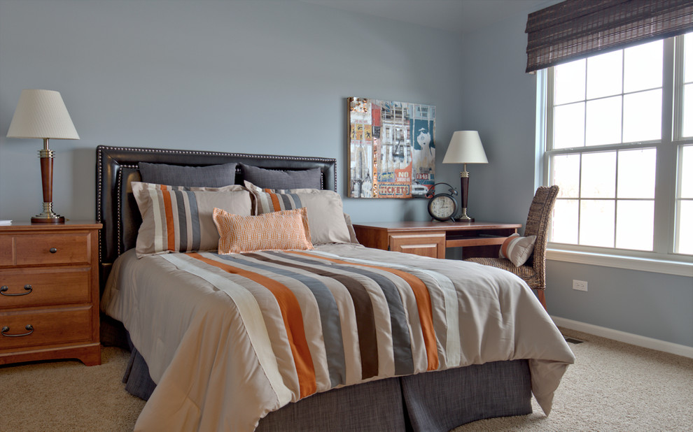 Example of a bedroom transitional boy carpeted kids' bedroom design in Chicago with blue walls