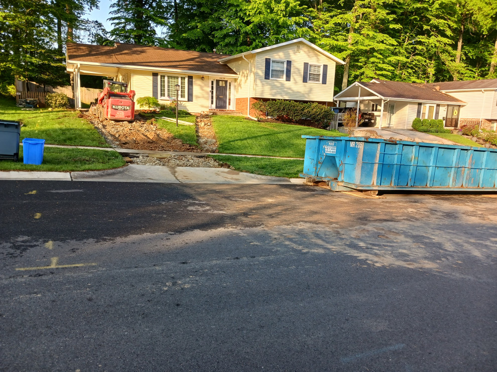 Concrete driveway , concrete patio , steps ,and landing