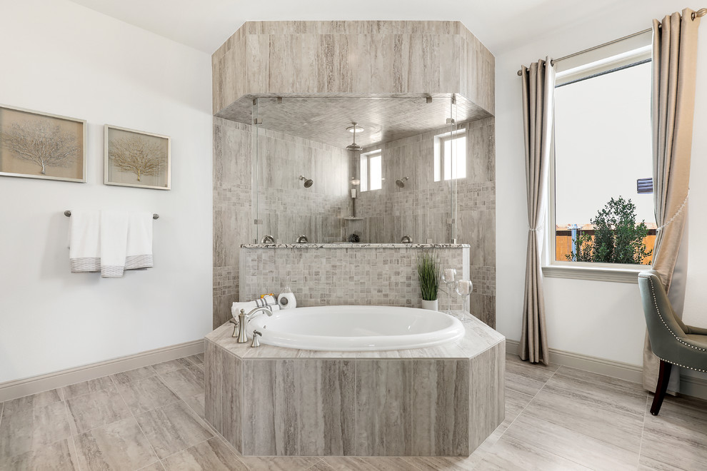 Photo of a large traditional master bathroom in Dallas with raised-panel cabinets, dark wood cabinets, a corner tub, a corner shower, beige tile, ceramic tile, white walls, ceramic floors, an undermount sink, granite benchtops, beige floor, an open shower and beige benchtops.