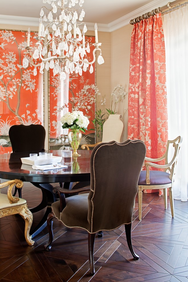 Traditional dining room in Miami with beige walls and dark hardwood floors.