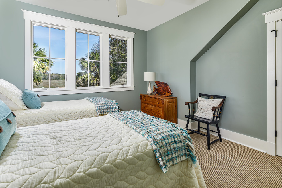 Inspiration for a mid-sized beach style guest bedroom in Charleston with green walls, carpet and beige floor.
