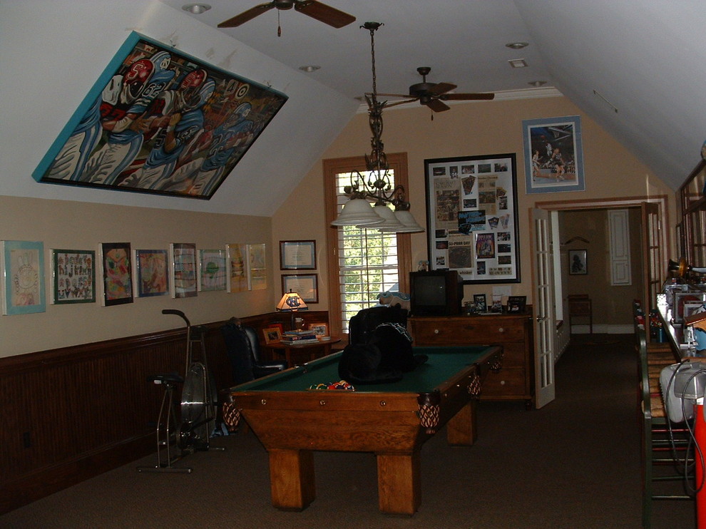 This is an example of a traditional family room in Charlotte.