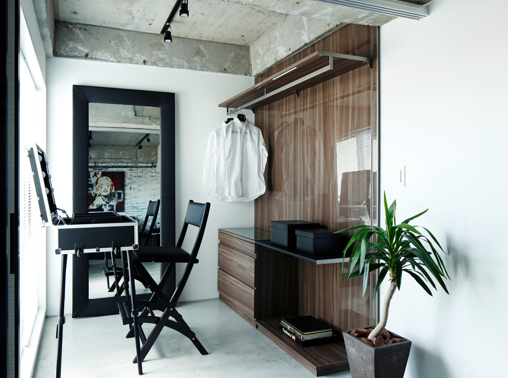 Design ideas for an industrial storage and wardrobe in Tokyo Suburbs.