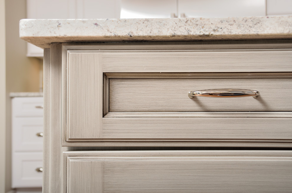 Example of a large transitional l-shaped medium tone wood floor home design design in Chicago with a single-bowl sink, recessed-panel cabinets, gray cabinets, granite countertops, gray backsplash, ceramic backsplash, stainless steel appliances and an island