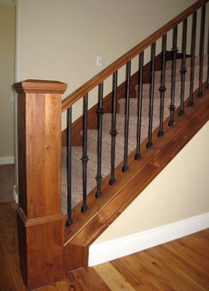 Wood Railing with Wrought Iron Balusters - Traditional - Staircase