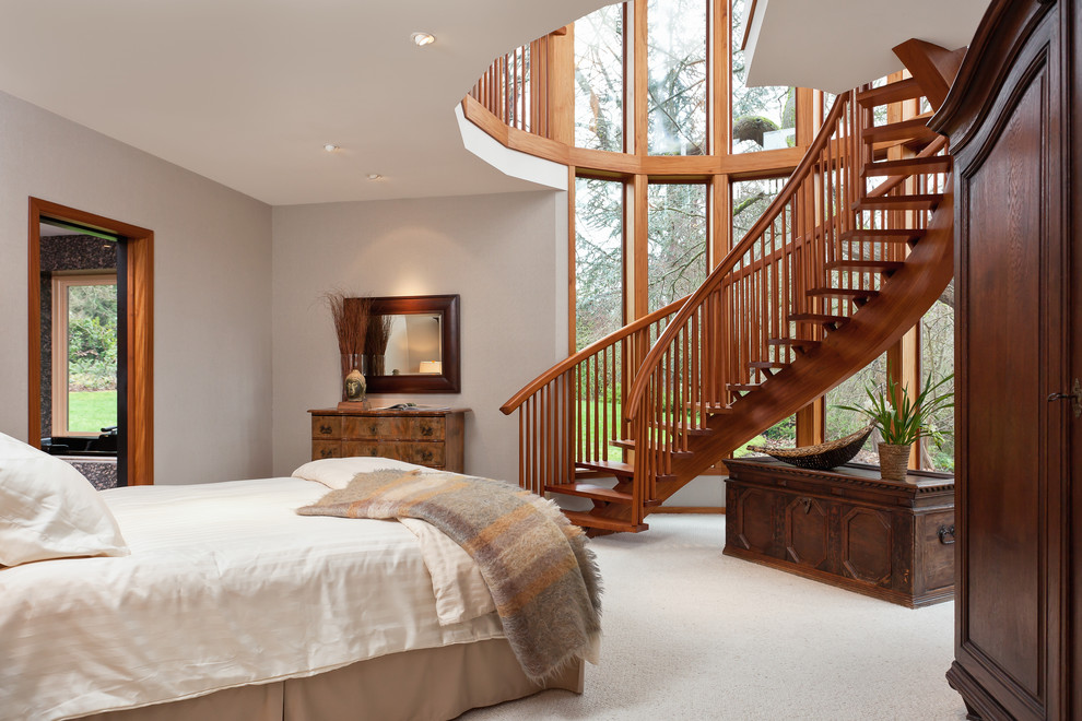 Design ideas for a traditional bedroom in Seattle with beige walls and carpet.