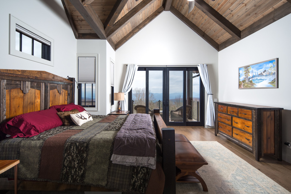 Inspiration for a rustic bedroom remodel in Charlotte